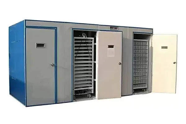 Commercial poultry incubator with removable egg trays